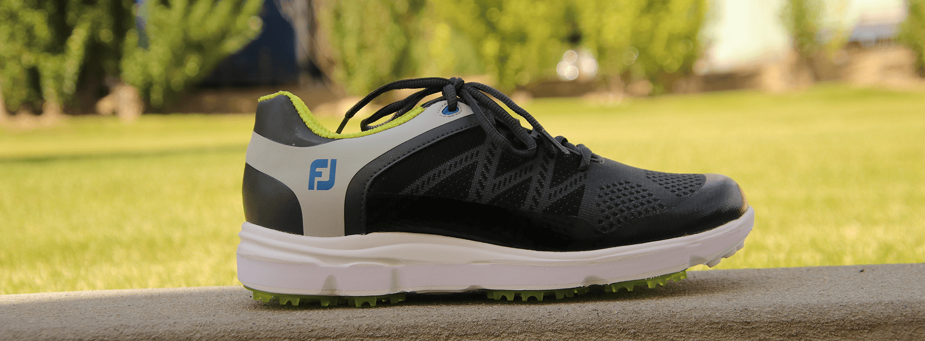 A lifted golf shoe